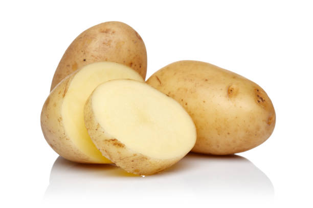 istock Raw potatoes with slices isolated 1209651624