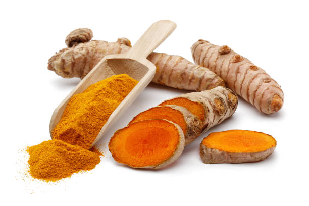 istock Fresh turmeric with slices and curcuma powder 1209651749