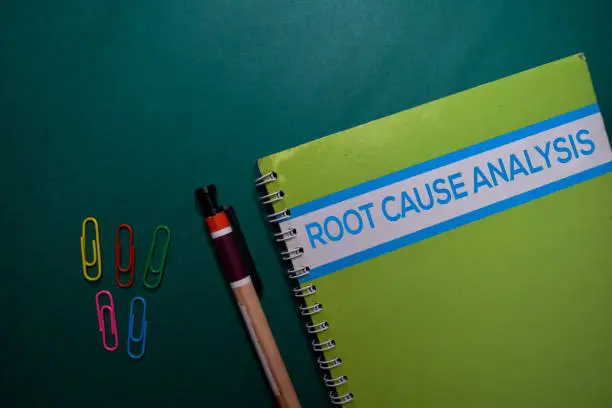 Photo of A Root Cause Analysis book isolated on Office Desk