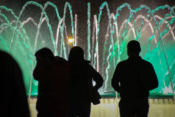 istock Neon colored fountains in water park 1209655159