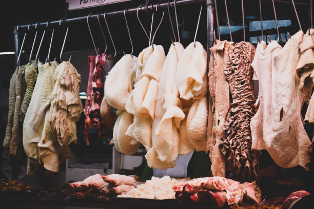istock Butchers inside the public market in Lima Peru. 1209655440