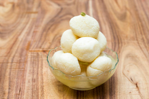 famous Bengali sweet "Rasgulla" is ready to serve famous Bengali sweet "Rasgulla" is ready to serve rosogolla stock pictures, royalty-free photos & images