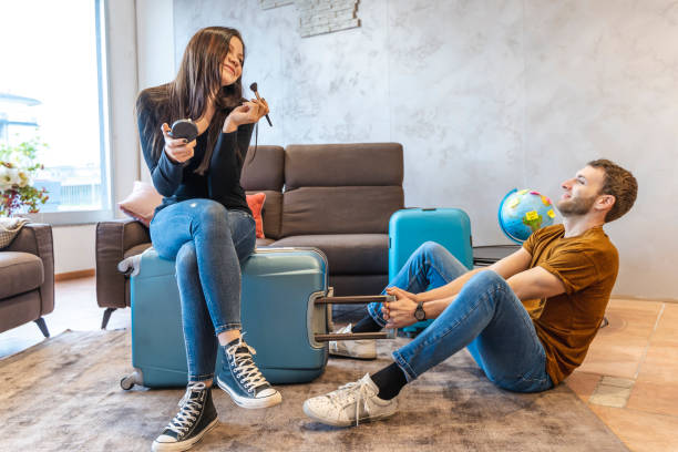 istock young woman is finishing her make up 1209659741