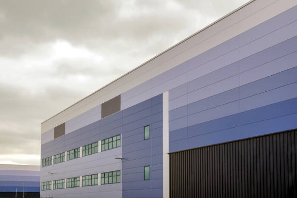 istock modern warehouse building over cloudy sky in england uk 1209660794