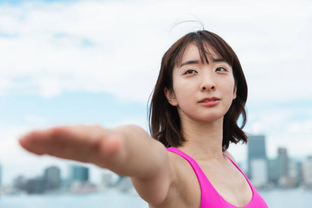 istock A young woman doing yoga 1209666788