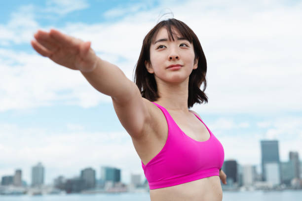 istock A young woman doing yoga 1209666812