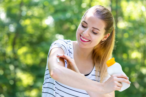 istock Young woman with sunscreen 1209672661