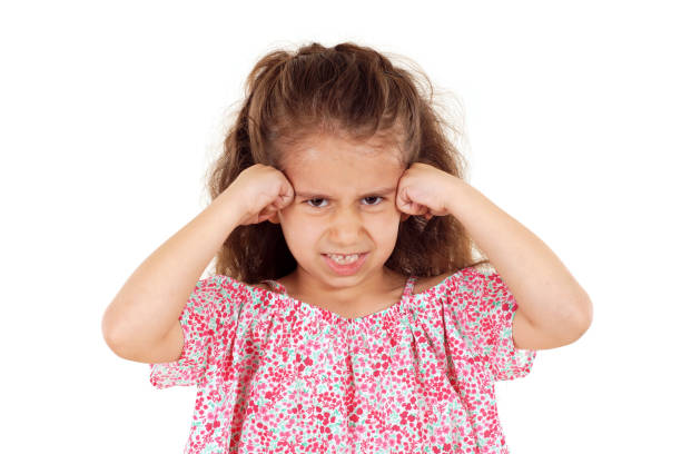 istock Anger little girl on white background 1209674492