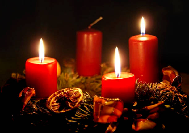 istock an Advent wreath with burning candles 1209675275
