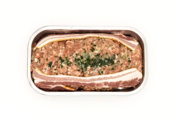 istock Meatloaf ready to bake in its aluminum tray 1209675761