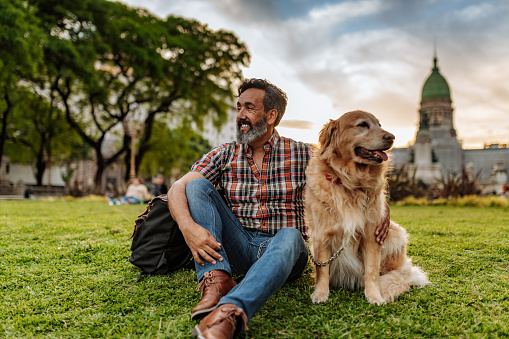 Mature Latino man with beard any stylish casual clothing in springtime day in Buenos Aires, Argentina. Shot takend with Nikon D850