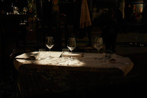 istock Table served in restaurant with wineglasses and napkins 1209676605