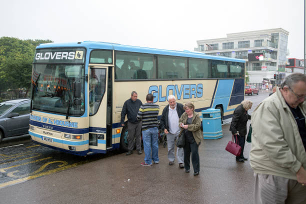 Skegness, Lincolnshire, UK: August 18th 2015. Holidaymakers and daytrippers make the best of the bad weather, Heavy rain all day on the promenade resulting in empty beaches, but indoor amusements are doing well.