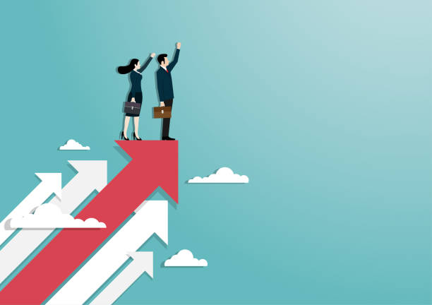 istock Businessman and woman raise hand standing on red arrow 1209679100