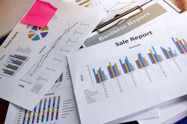 istock Business paper chart plenty on wooden desk,data for doing work. 1209681427