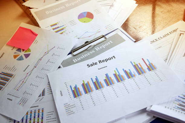 istock Business paper chart plenty on wooden desk,data for doing work. 1209681433