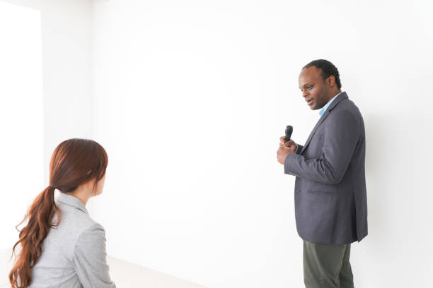 istock Two business person having presentation 1209681460