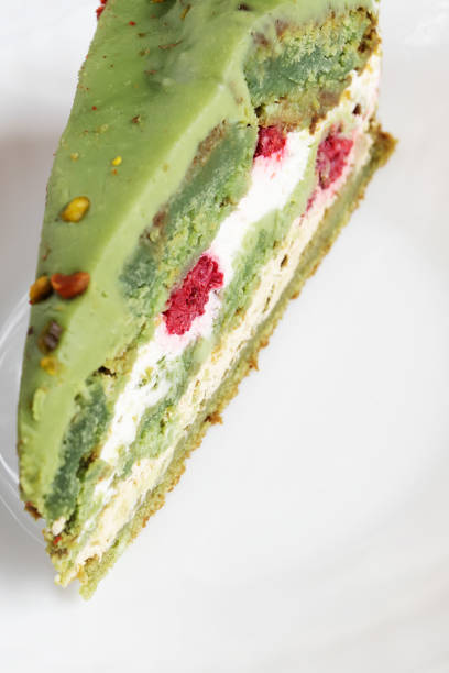 istock Cake with pistachios and raspberries 1209681579