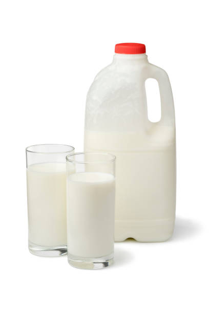 istock Plastic can and glass with fresh organic buttermilk 1209681993