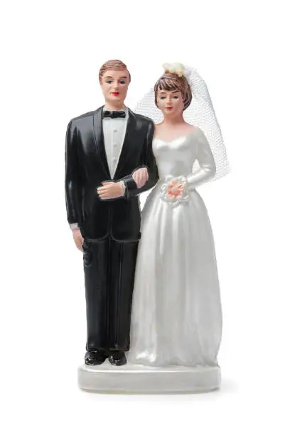 Bride and groom, vintage cake topper isolated on white background