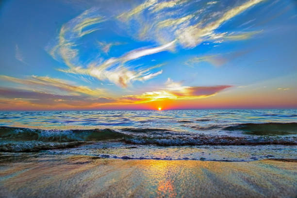 istock Sun on the Horizon at Sunset at Ocean 1209682871