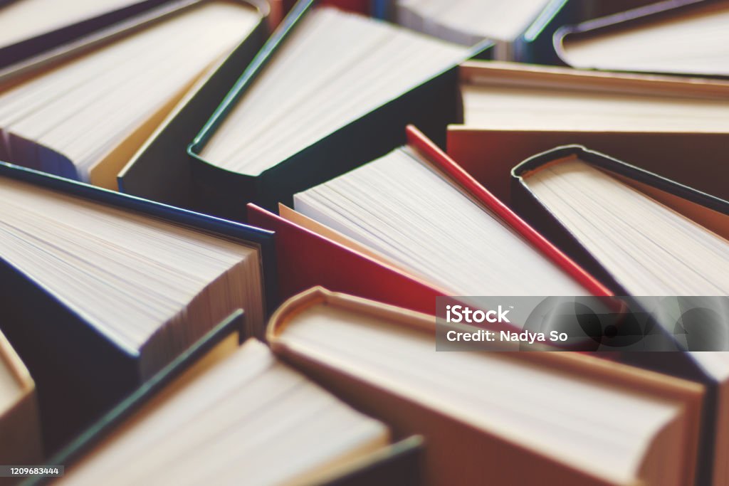 Many hardbound books background, selective focus Book Stock Photo
