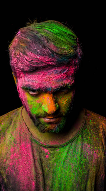 istock man in holi colors 1209683463