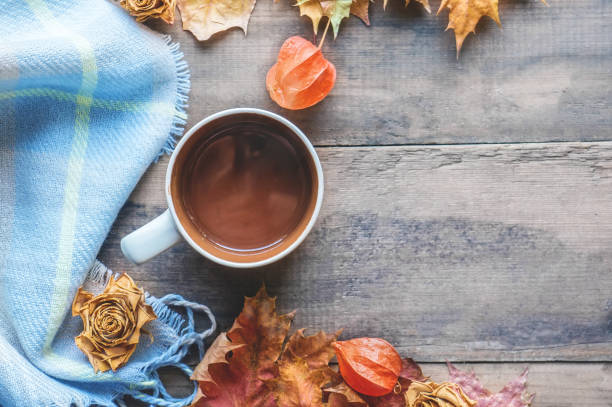 istock beautiful autumn composition with tea. autumn leaves and cups with grape sugar on a rustic tree background. the concept of the fall season. soft selective focus 1209684605