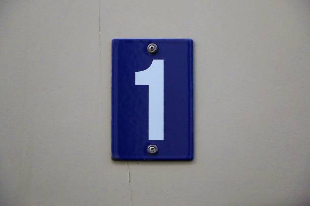blue sign with a white number one close up