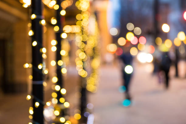 Holiday night street scene, blurred for background.