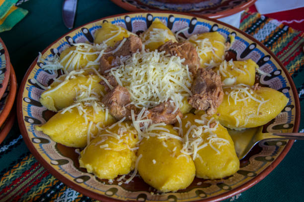 Natural food, hominy or mamaliga on a plate with grated cheese on top, traditional bulgarian meal Cooked lunch, dinner, healthy food concept, food on a plate mamaliga stock pictures, royalty-free photos & images