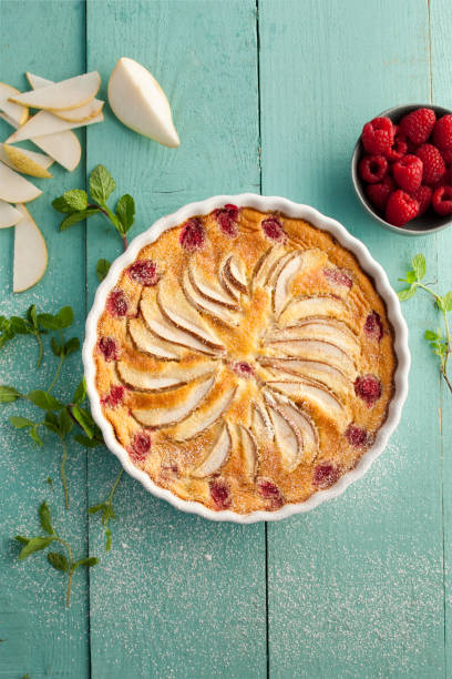 Pear tart with raspberries. Pear tart with raspberries. tart dessert stock pictures, royalty-free photos & images