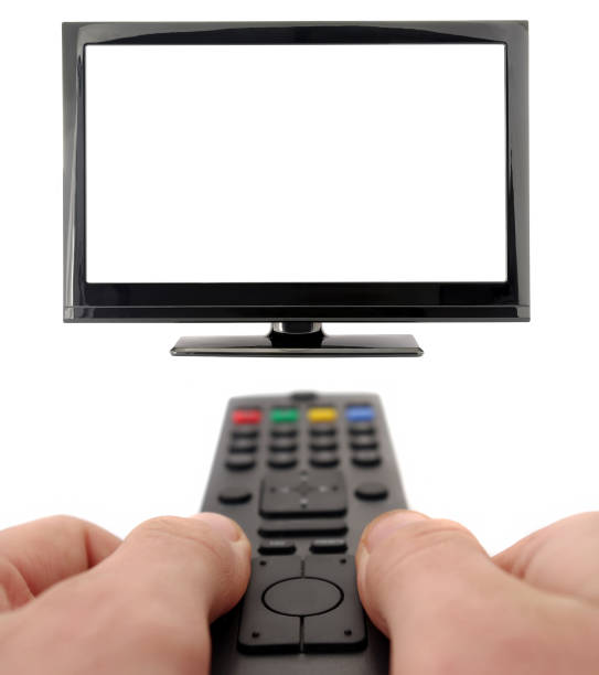 istock hands with remote for tv with white 1209709337