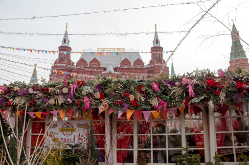 Russia, Moscow: – March 01, 2020: Moscow Maslenitsa Festival. Traditional national celebration in russian folk style. Holiday decor, market, fair at Manezhnaya Square.