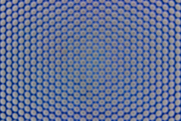 istock Polka Dot Abstract background with row and parallel pattern in gray and blue. 1209713332