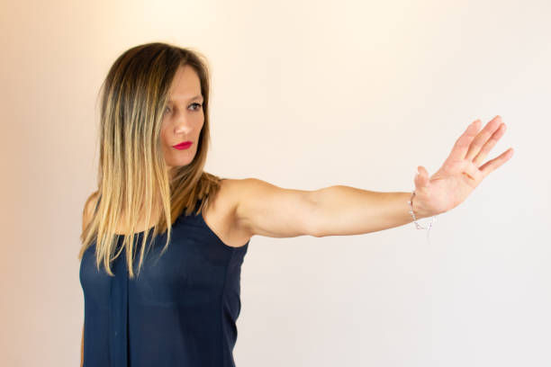 istock Woman says stop with her hand 1209714482
