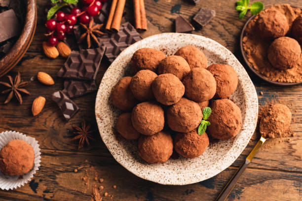 istock Tasty chocolate truffles on plate 1209716400