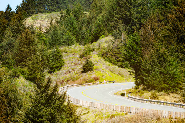 istock Mountain road in California turn between rocks 1209722584