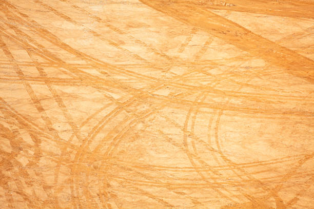 Car traces on construction ground side over dust clay and sand view from above