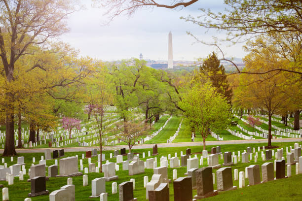 istock Washington Monument obelisk and Arlington cemetery 1209722869
