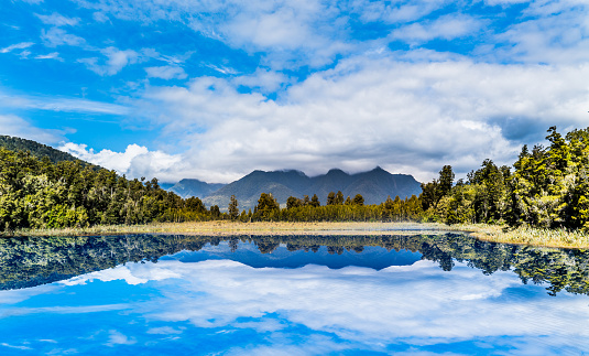 Mirror lake near Hokitika on the Southern island of New Zealand