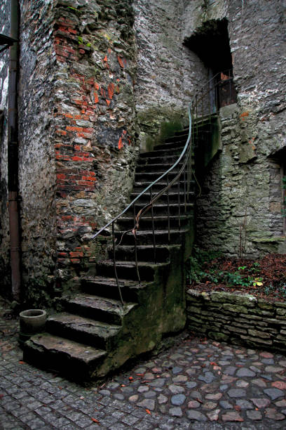 istock antique curved staircase in the courtyard 1209729878