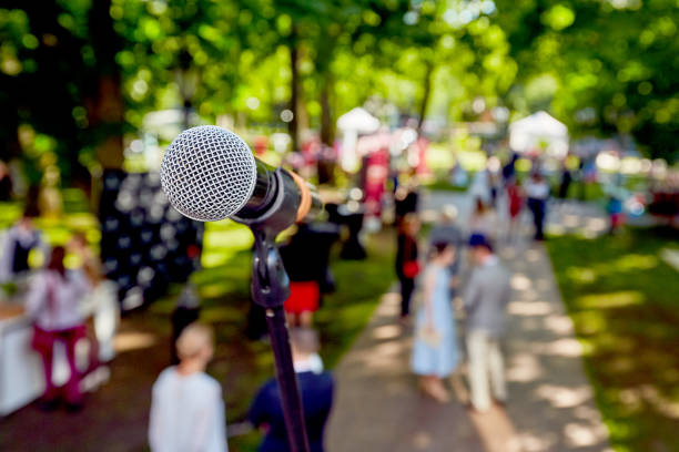 istock Microphone for concert outdoor event 1209732858