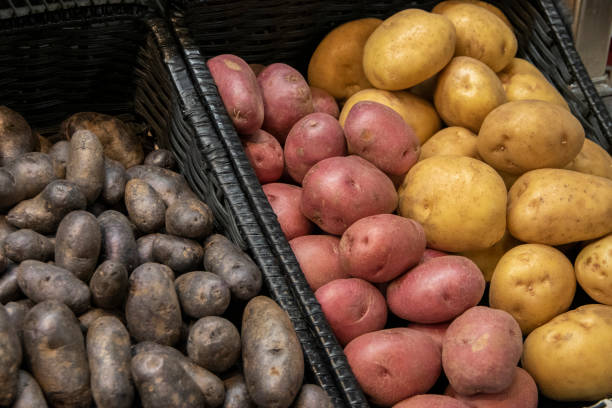 istock Blue, Red and Yellow Potatoes 1209734273