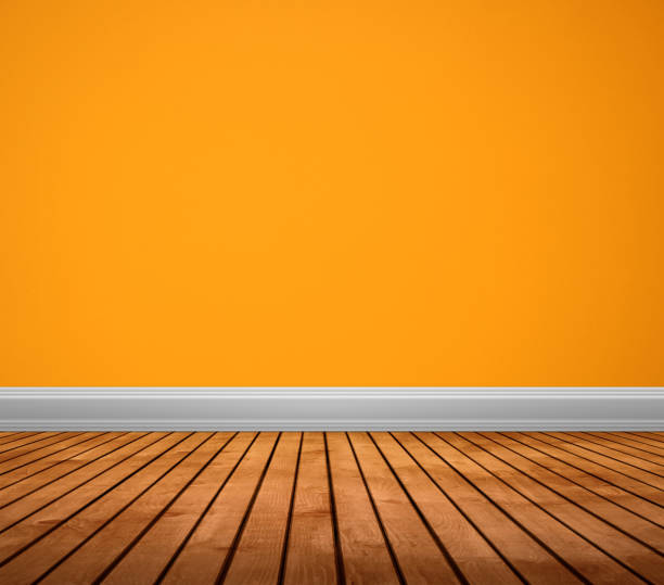 istock Empty Orange Wall and Wooden Floor with Room Background 1209741938