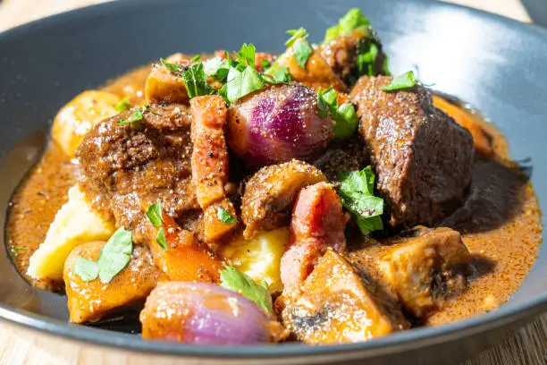 boeuf bourguignon or Beef bourguignon with burgundy wine and Bouquet garni and burgundy set