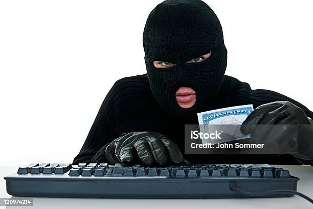 Burglar Stealing An Identity Stock Photo - Download Image Now - Con Man, Network Security, Harassment