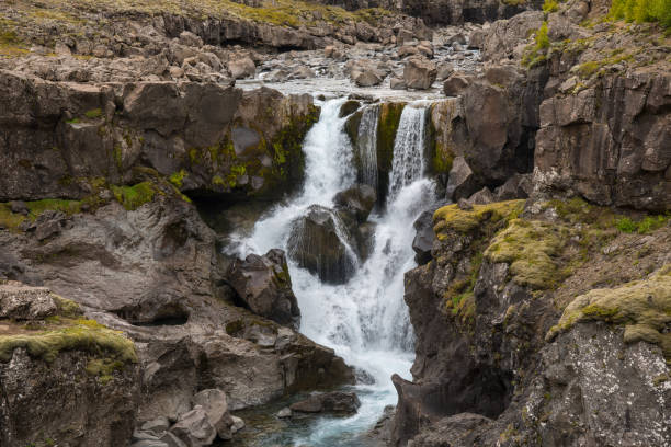 Waterfall in Fossa river in east Iceland near Djupivogur