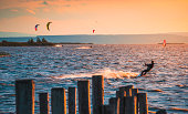 Kite Surfers at a Lake Sunset