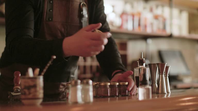 Bartender cleaning the bar counter